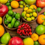 top-view-fresh-fruits-different-ripe-mellow-fruits-white-background-berry-tasty-health-color-diet